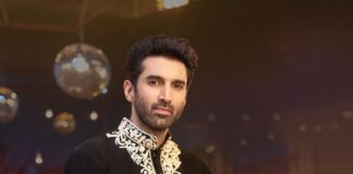 Aditya Roy Kapur in a black embroidered occasionwear ensemble for KORA by NM