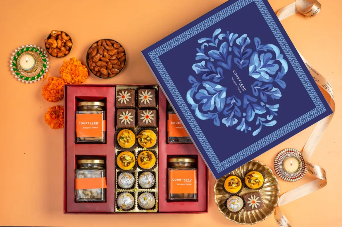 Navy Diwali hamper box with sweets and gourmet treats from Courtyard by Marriott Bengaluru Hebbal
