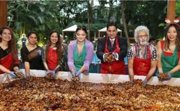 Taj West End, Bengaluru, Welcomes the Festive Season With Its Annual Cake Mixing Ceremony Guests mixing dried fruits and nuts at the Cake Mixing Ceremony, Taj West End, Bengaluru