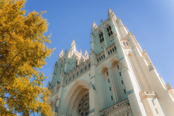 Washington National Cathedral in fall Washington National Cathedral with autumn foliage and a blue sky